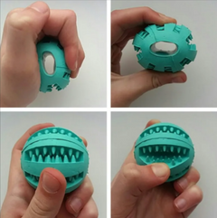 Teal dog chew toy with textured grip and hollow design for interactive play
