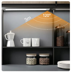 Smart under-cabinet LED light with 120° beam angle and 3m detection range, illuminating kitchen shelves with mugs and jars.