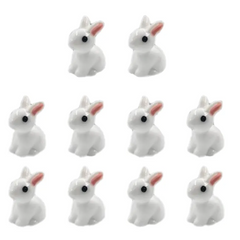 Adorable white ceramic bunny figurines with pink ears, perfect for Easter or home decor gifts