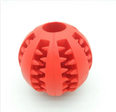Red rubber dog chew toy with textured spikes and hollow center for interactive play