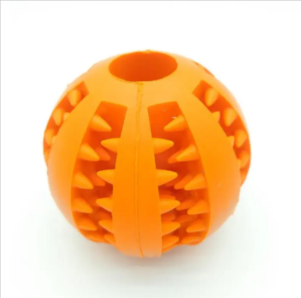 Orange spiked dog chew toy ball for interactive play and dental care