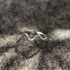 Elegant wavy ring with sparkling stones, perfect gift for her