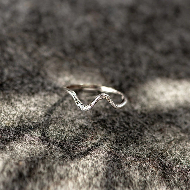 Elegant wavy silver ring with sparkling stones, perfect gift for her, delicate jewelry design