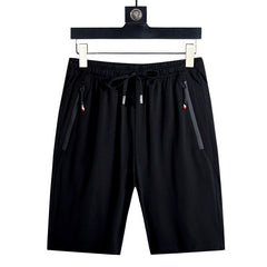 Black drawstring shorts with side zippers, casual men's summer wear