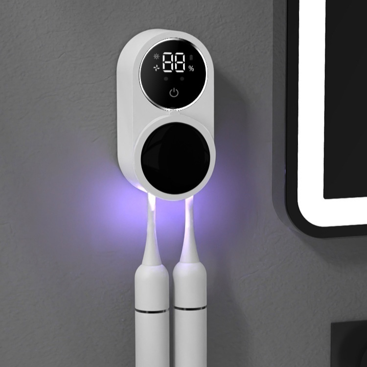 Smart UV toothbrush sanitizer with digital display and purple light, wall-mounted for bathroom use