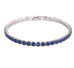 Elegant blue sapphire tennis bracelet with silver setting, perfect for gifting