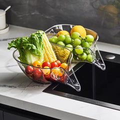 Clear kitchen colander with fresh veggies and fruits, perfect for washing produce