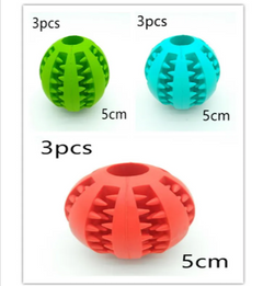 Colorful 5cm pet chew balls in green, blue, and red for interactive play and dental care