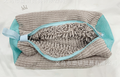 Soft chenille pet bed with teal mesh sides and cozy interior, ideal for small pets