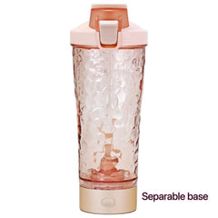 Pink textured portable blender with separable base, ideal for smoothies and family gifts