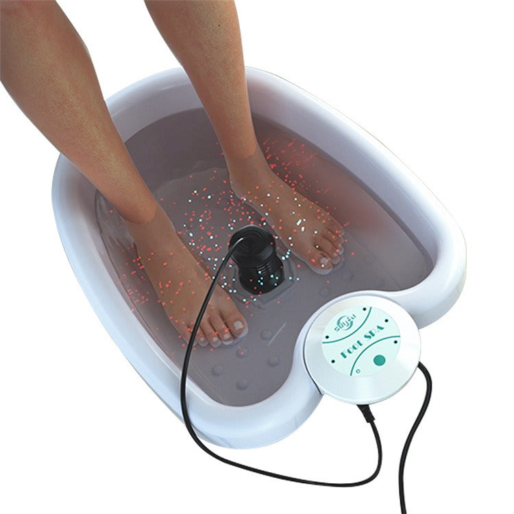 Electric foot spa with bubbling water and LED lights for relaxing foot massage at home