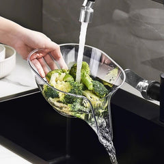 Clear vegetable washer strainer rinsing broccoli under faucet, kitchen sink colander