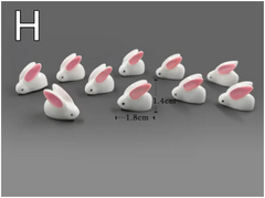 Adorable white bunny figurines with pink ears, perfect for Easter gifts or home decor, measuring 1.8cm x 1.4cm.