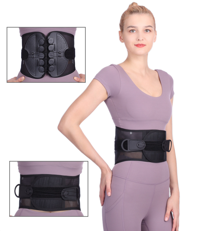 Black adjustable back support belt for posture correction and lower back pain relief, worn by woman in activewear