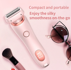 Pink portable electric shaver with digital display, ideal for smooth skin on-the-go, paired with sunglasses and makeup brush
