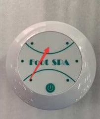 White foot spa timer with green dial and power button, ideal for relaxation and home wellness