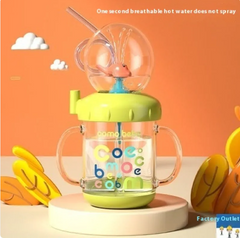 Colorful baby sippy cup with straw, dual handles, and playful design for safe toddler drinking