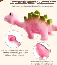 Pink dinosaur stress toy with green spikes, pull tail to launch, fun decompression gift for kids
