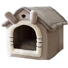 Cozy gray plush pet house with soft fleece lining and cute ear details, perfect for cats or small dogs.