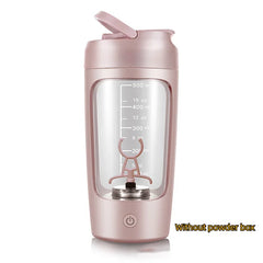 Pink portable blender with 500ml capacity, measurement markings, and USB charging base, ideal for smoothies and shakes