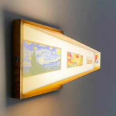 Wooden wall light with illuminated art prints, perfect for home decor and unique gifts