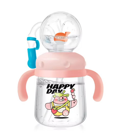 Pink baby sippy cup with cartoon character, straw, and handles for toddler drinks