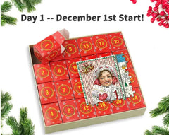 Red Christmas advent calendar with numbered drawers, holiday puzzle, and festive greenery