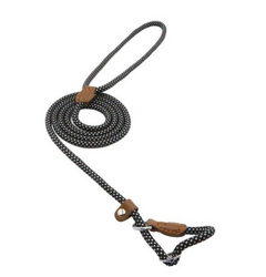 Black and white dotted dog leash with brown leather handle and metal clasp, coiled on white background