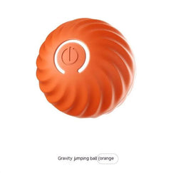 Orange gravity jumping ball with power button, fun fitness toy for kids and adults