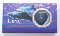 Dolphin-themed gift box with heart-shaped pendant, perfect for love-themed presents and family gifts
