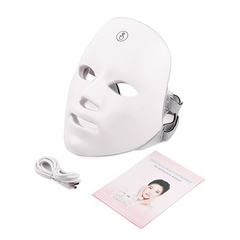 White LED facial mask with USB cable and instruction manual for at-home skincare beauty treatment