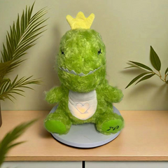Green plush dinosaur with yellow crown and heart bib, cozy kids gift