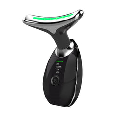 Black facial massager with green LED lights, EMS, and hot therapy settings for skincare