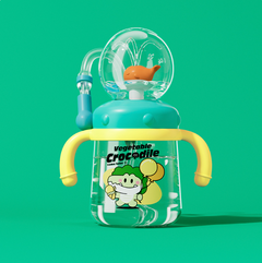 Cute crocodile-themed baby sippy cup with straw and handles, perfect for toddler drinks