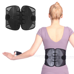 Black back posture corrector with massage nodes, worn by woman for spinal alignment and support
