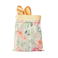 Floral bread bag holding fresh baguettes, perfect for kitchen storage or gifting