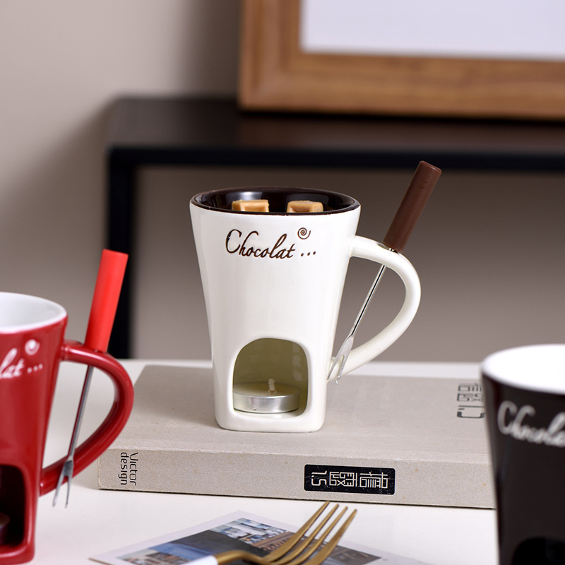 White ceramic chocolate fondue mug with candle base, perfect for cozy gatherings and dessert lovers
