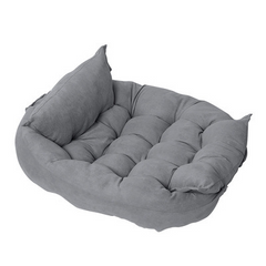 Gray plush pet bed with tufted cushion and supportive sides for cozy comfort