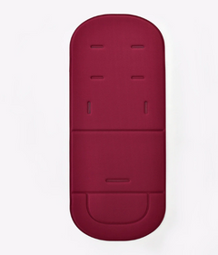 Deep red baby stroller seat pad with ventilation slots and contoured design for comfort
