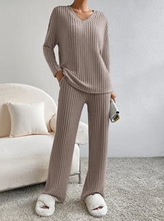Cozy ribbed knit pajama set with V-neck top and wide-leg pants, perfect for lounging at home
