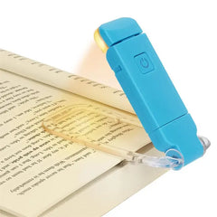 Blue portable book light illuminating open book pages, perfect for reading gifts