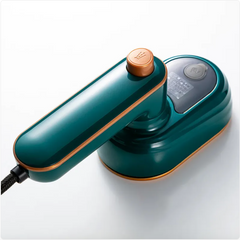 Teal handheld garment steamer with copper accents for wrinkle removal
