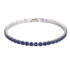 Elegant blue sapphire tennis bracelet with silver setting, perfect for gifting