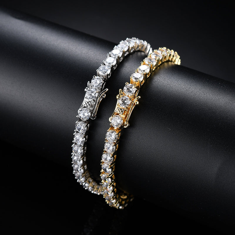 Elegant gold and silver tennis bracelets with sparkling clear stones, perfect for gifting or personal style.