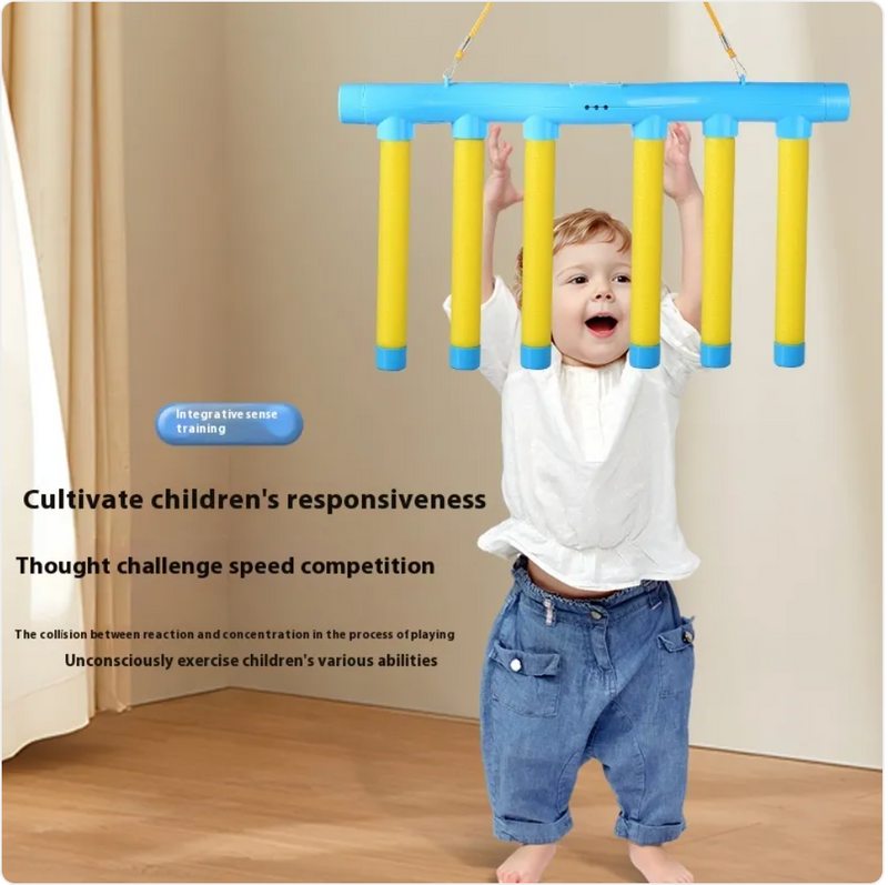 Toddler playing with blue and yellow hanging reaction game for kids' responsiveness training