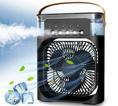 Portable misting fan with cooling mist, ice cubes, and green leaves for home or office use