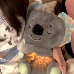 Cozy gray koala plush toy with soft texture, perfect for family gifts and bedtime comfort.