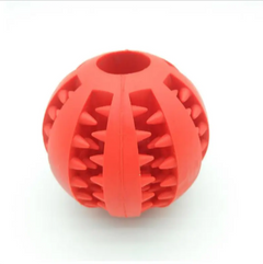 Red rubber dog chew toy with textured spikes and hollow center for interactive play