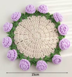 Handmade crochet coaster with purple roses and green leaves, 15cm diameter, perfect for home decor or gifts