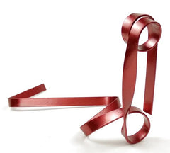 Shiny red ribbon for gift wrapping and decorative presents